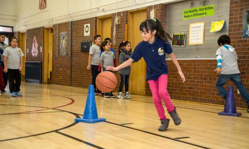 Goldrick_Elementary_School_Student_Playing_Basketball 